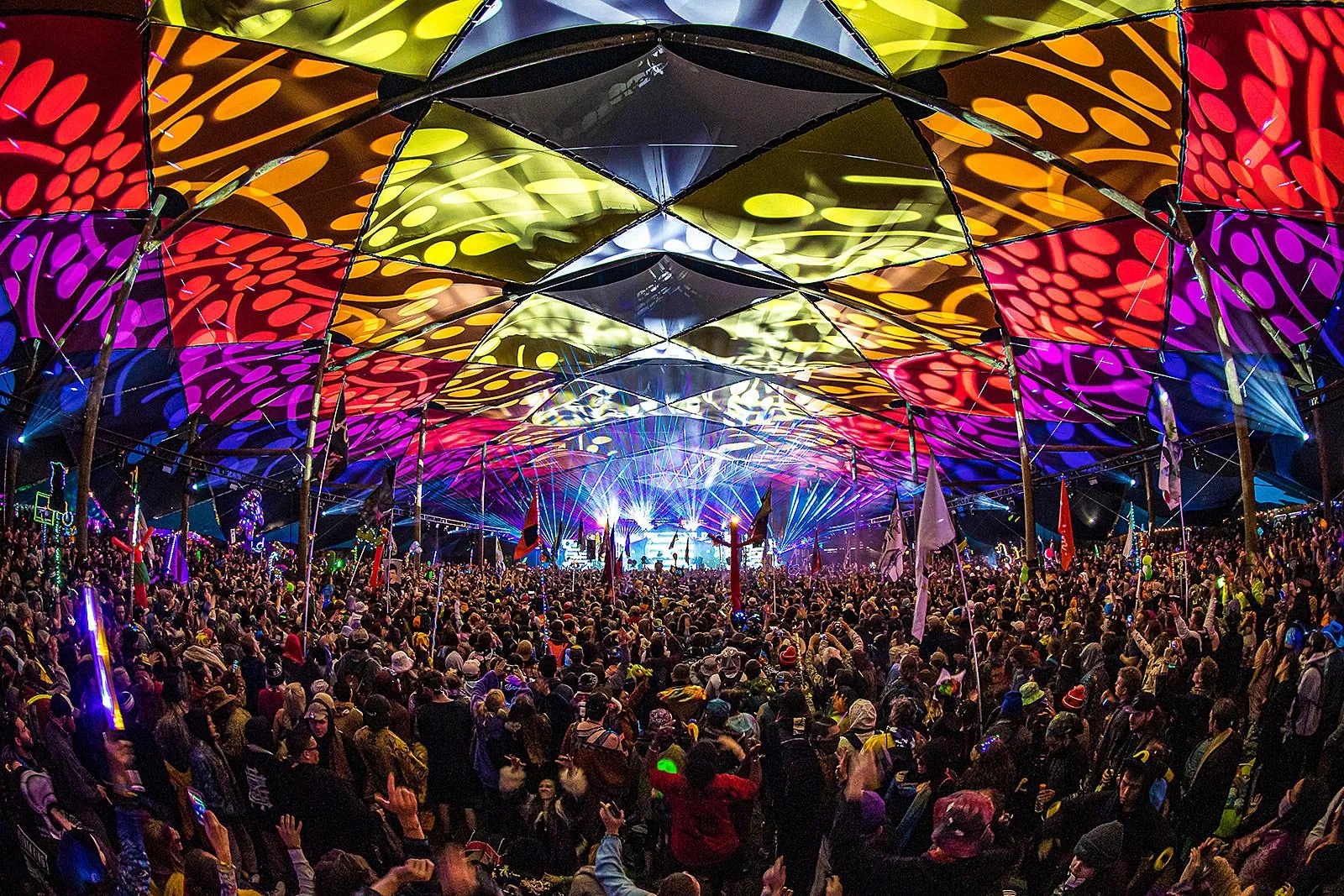 Festival crowd beneath the canopy — festival photograph